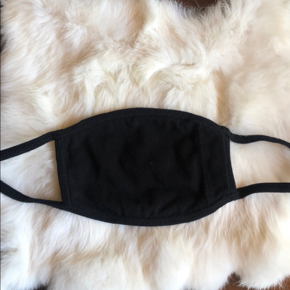 USA Washable face fabric black mask with a pocket.